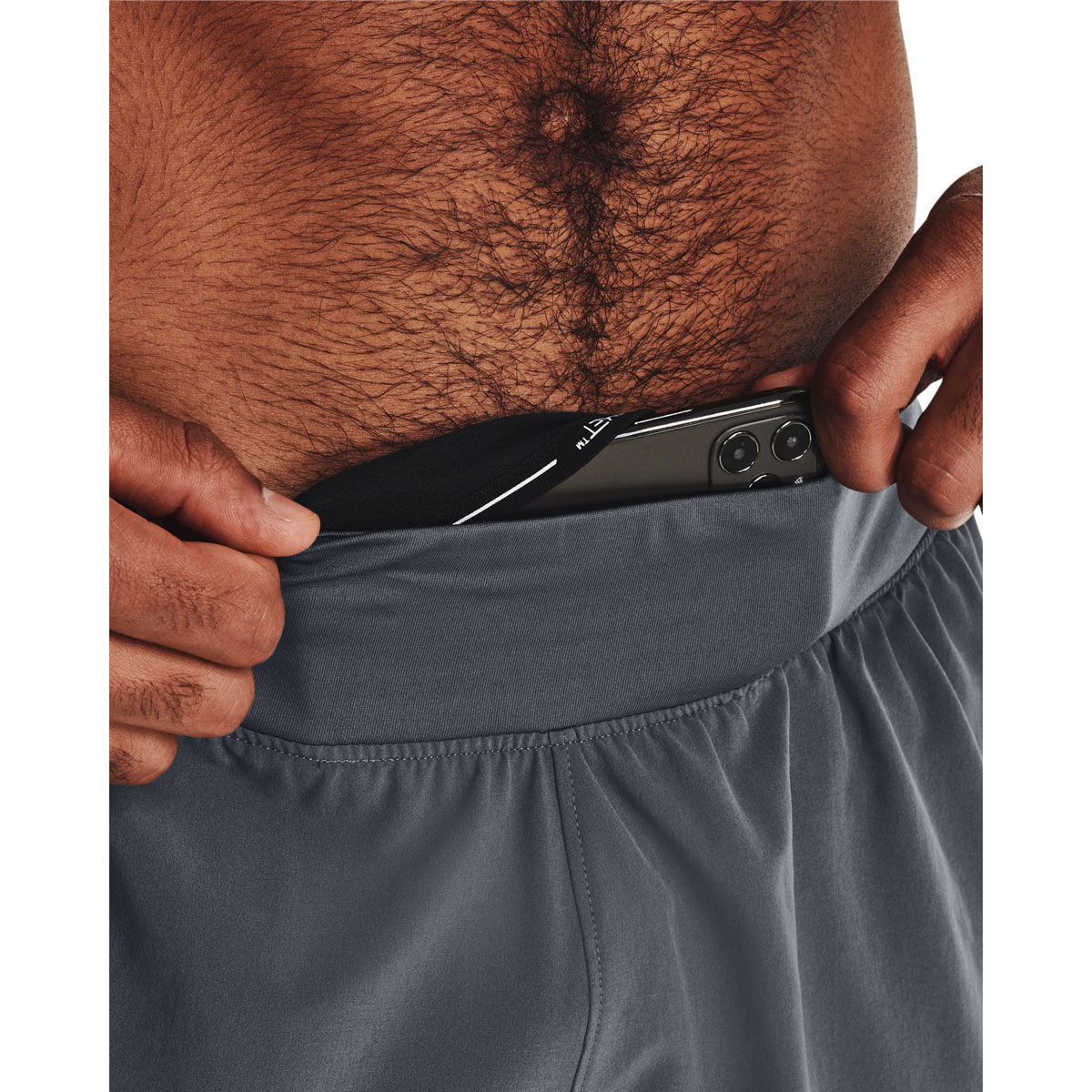 Under Armour Men's Speedpocket 7-inch Shorts : : Clothing, Shoes &  Accessories